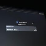 A dark-themed chat interface displaying an AI assistant conversation starter on a screen.