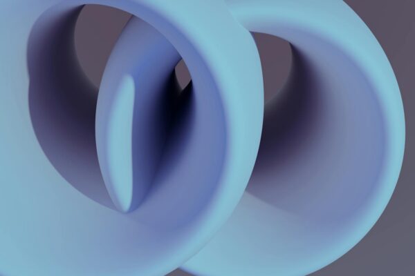 A captivating abstract 3D render featuring smooth, interlocking shapes in soft blue tones.