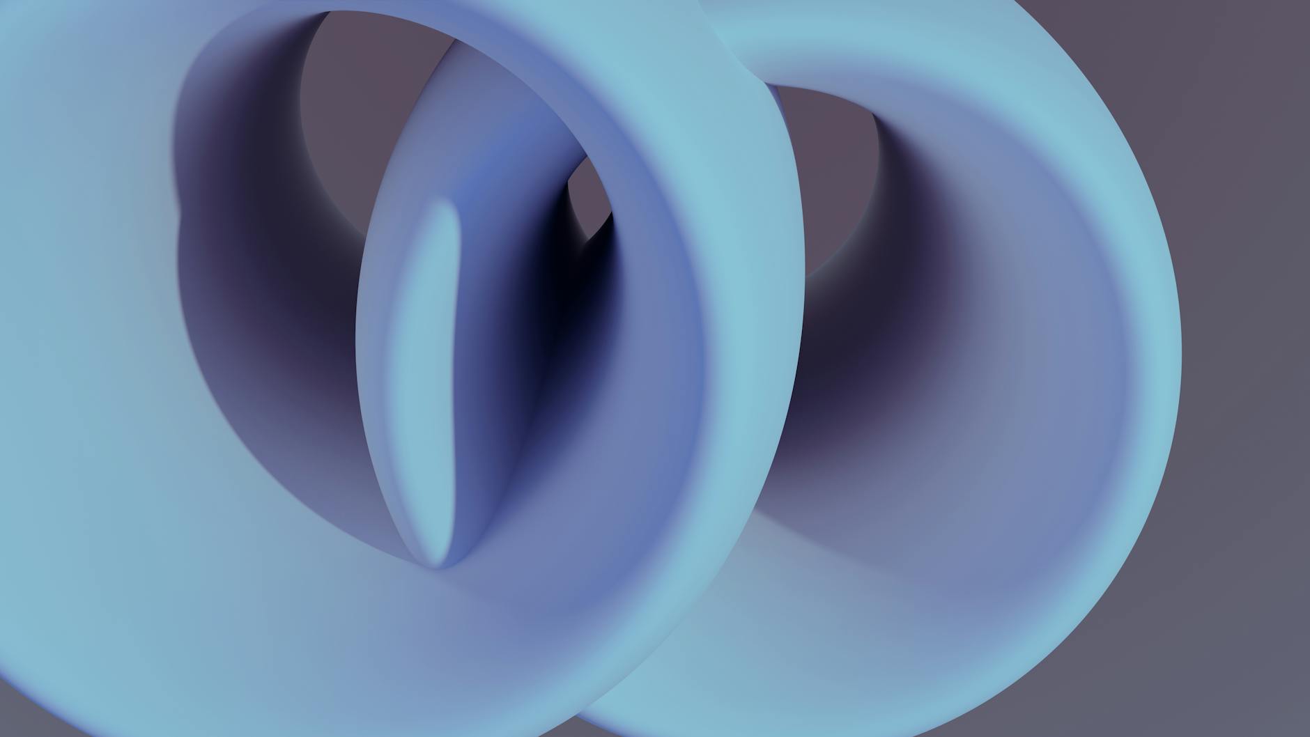A captivating abstract 3D render featuring smooth, interlocking shapes in soft blue tones.