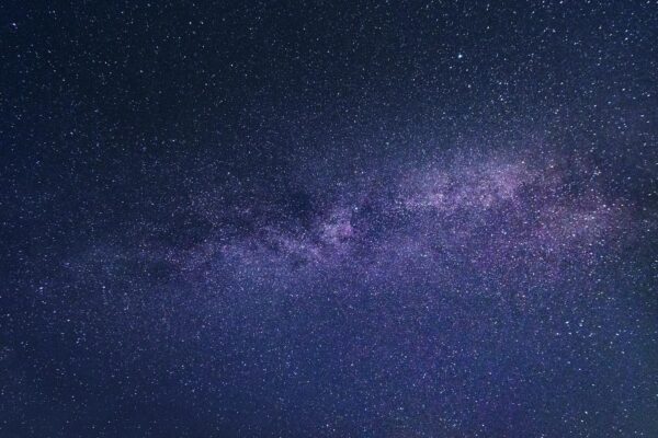 A breathtaking photo of the Milky Way galaxy captured on a clear night sky, showcasing the beauty of the cosmos.